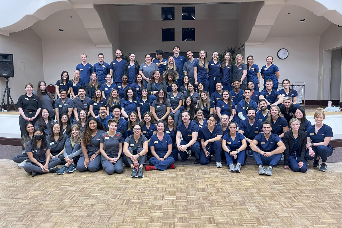 group photo of physical therapy workers in uniform